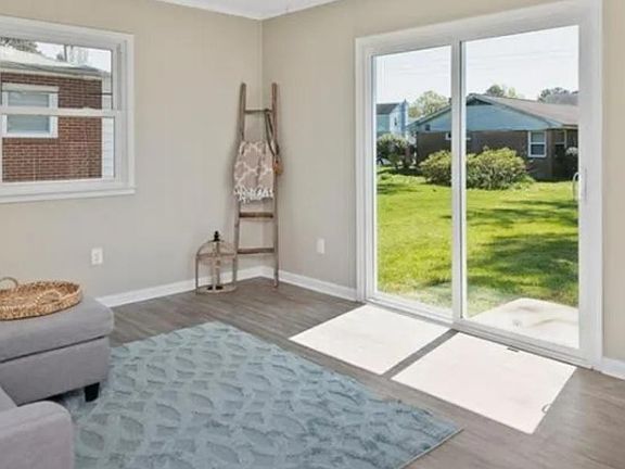 Common Space Living Room w Access to the Backyard