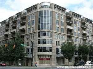 On corner of W. Trade & Cedar