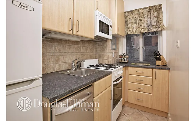 Sold by Douglas Elliman | media 12