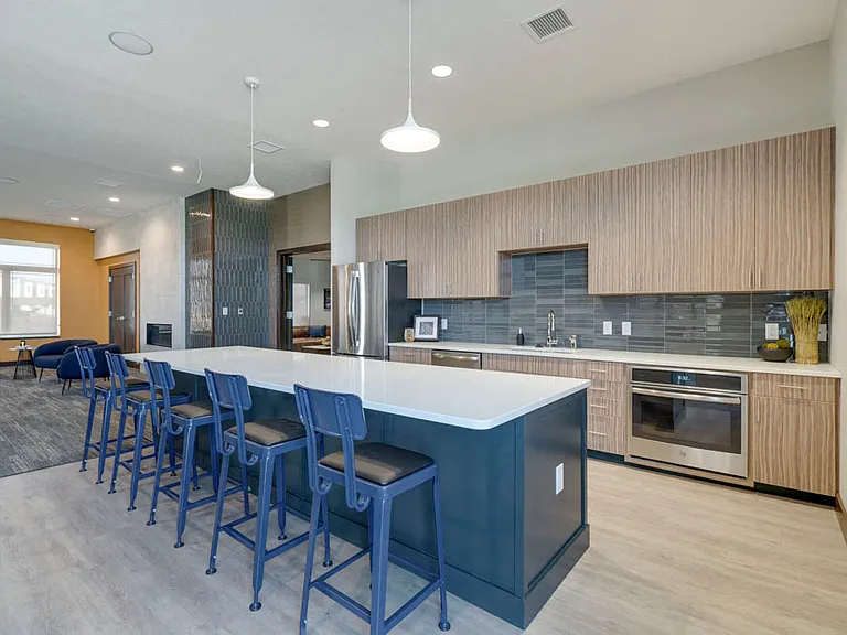 Our clubhouse kitchen is perfect for when you want to entertain large groups. It's also perfect for resident functions we'll throw throughout the year.