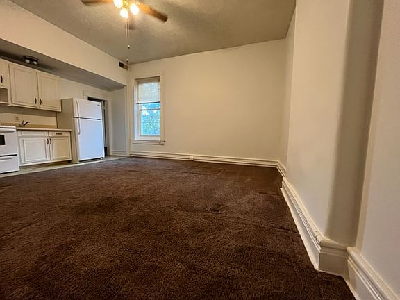 Open concept kitchen/living room. 12 foot soaring ceilings well insulated and no walls shared with any neighbors for quiet!