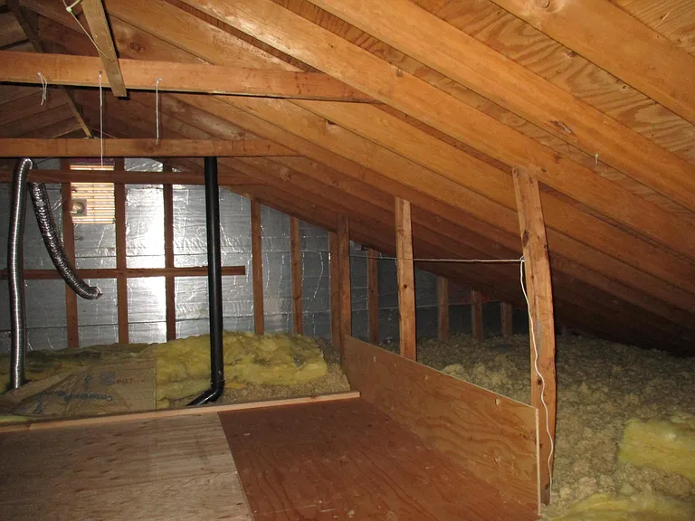 Flooring in attic space for extra storage.