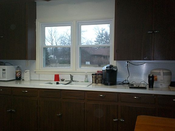 All new windows!  View of the large back yard and new patio, from your kitchen window.