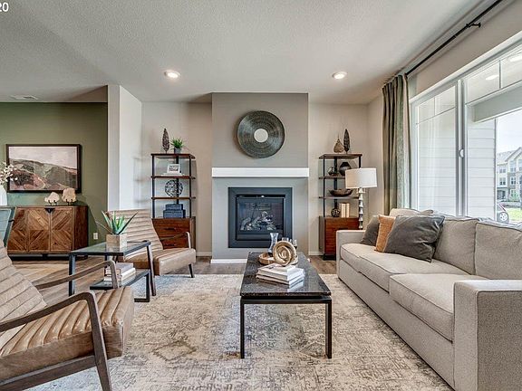 Fire Place in Living Room; Room Windows opens to Park