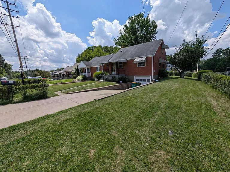 view from corner of Sunset and Thompson run