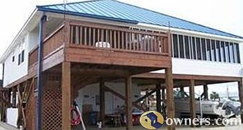 Back of house with sun deck