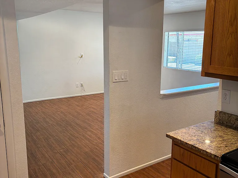 Kitchen viewing into living rm