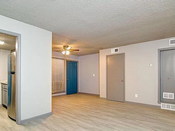 Step into style with this modern apartment featuring elegant design elements.