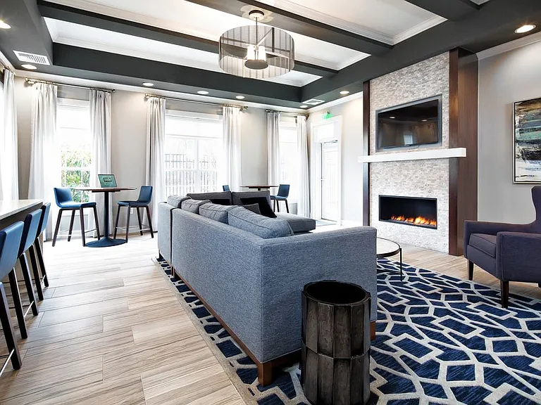Resident lounge with kitchenette and lounge seating
