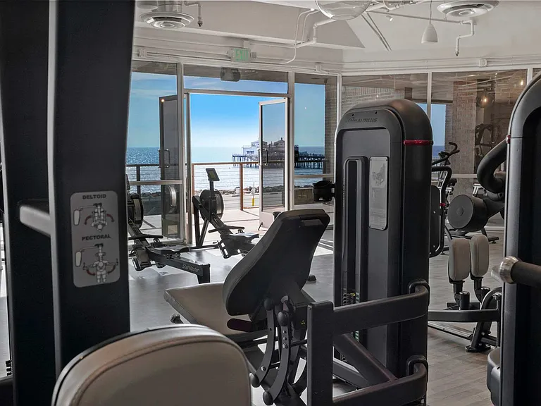 Maintain your routine at CURE Spa, a premier wellness club nearby, where cutting-edge fitness meets breathtaking ocean views.