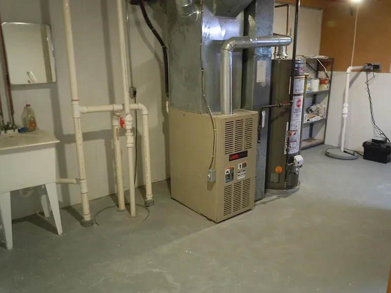 Unfinished Utility Room in Lower Level with Extra Storage Space