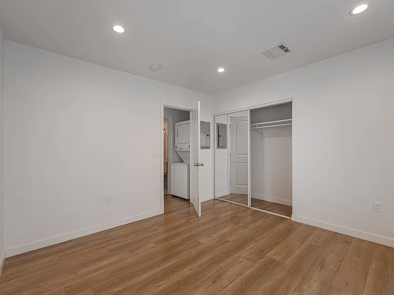 Renovated Bedroom with Recessed lighting and closet