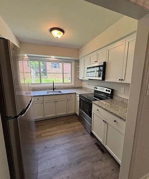 Kitchen has plenty of storage and light