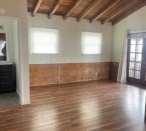 Large room/ bedroom or office with ocean view and deck