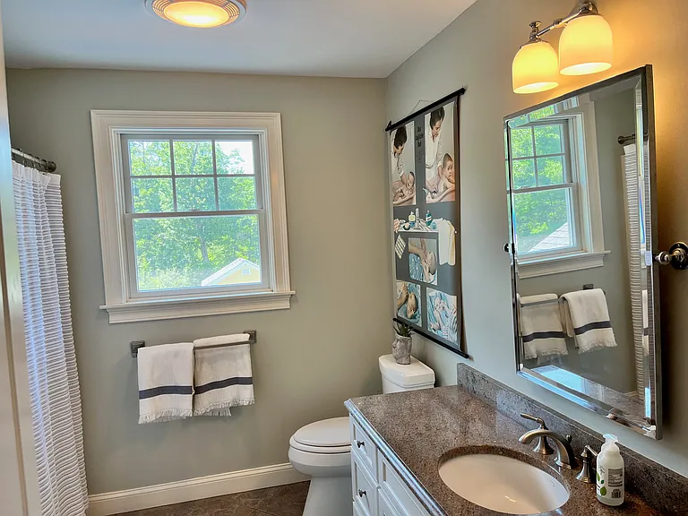 Second floor full bath with tub and shower.