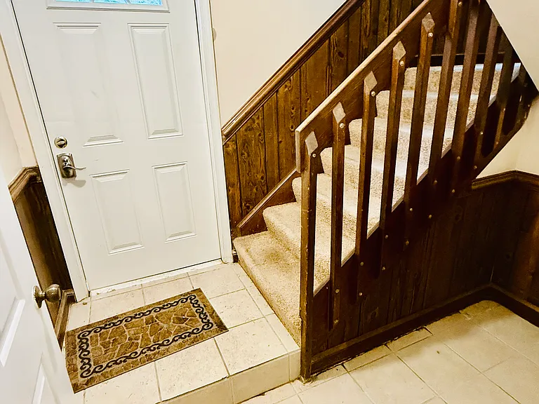 Next to the side door are the inside stairs of the building