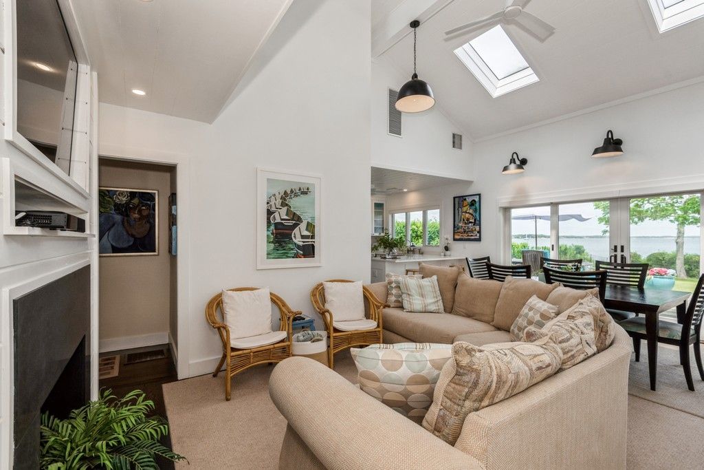 Open Living Room with Fireplace and Flat Screen tV