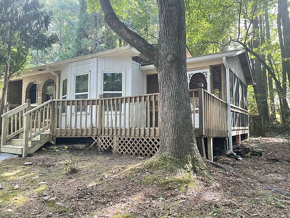 Exterior with side porch and deck
