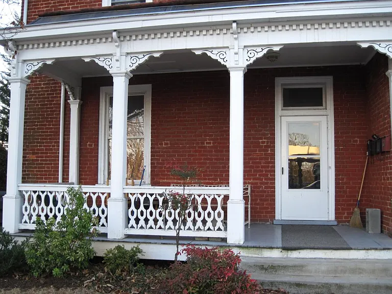 Front entry to foyer. The porch is available for tenant use. Front entry is shared with one other tenant who lives upstairs.