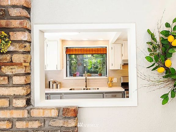 Dining Room Window to Kitchen (Photo from Previous Listing)