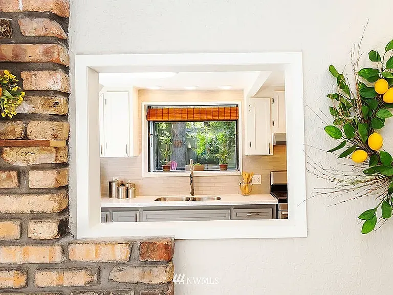 Dining Room Window to Kitchen (Photo from Previous Listing)