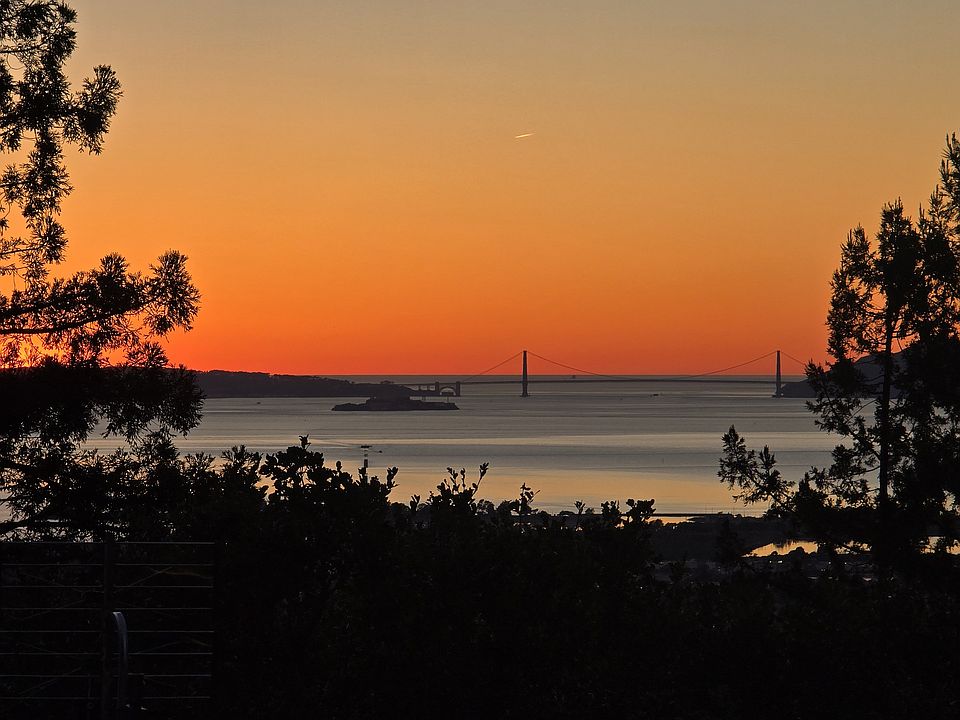 Sunset right outside the dining room window. Fantastic views of the Golden Gate Bridge.