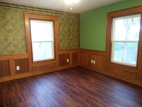 1st Bdrm: Block Paneling & Wallpaper touches. New Flooring
