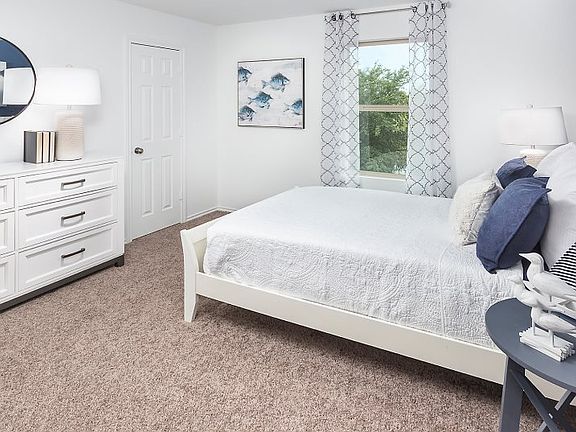 All four bedrooms are tucked on the second floor, providing privacy for family living.