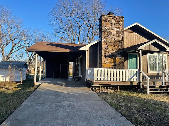 Front View with Carport