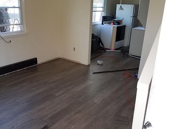 Living room, from entry, toward kitchen (during renovation).