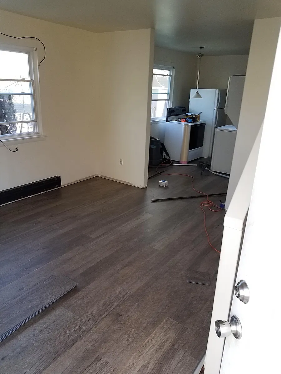 Living room, from entry, toward kitchen (during renovation). - 50 Devonshire Ave