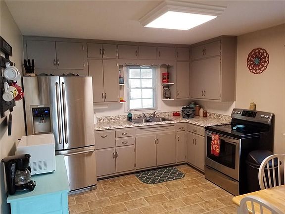 Large kitchen with refinished cabinets and tops...simply gorgeous!