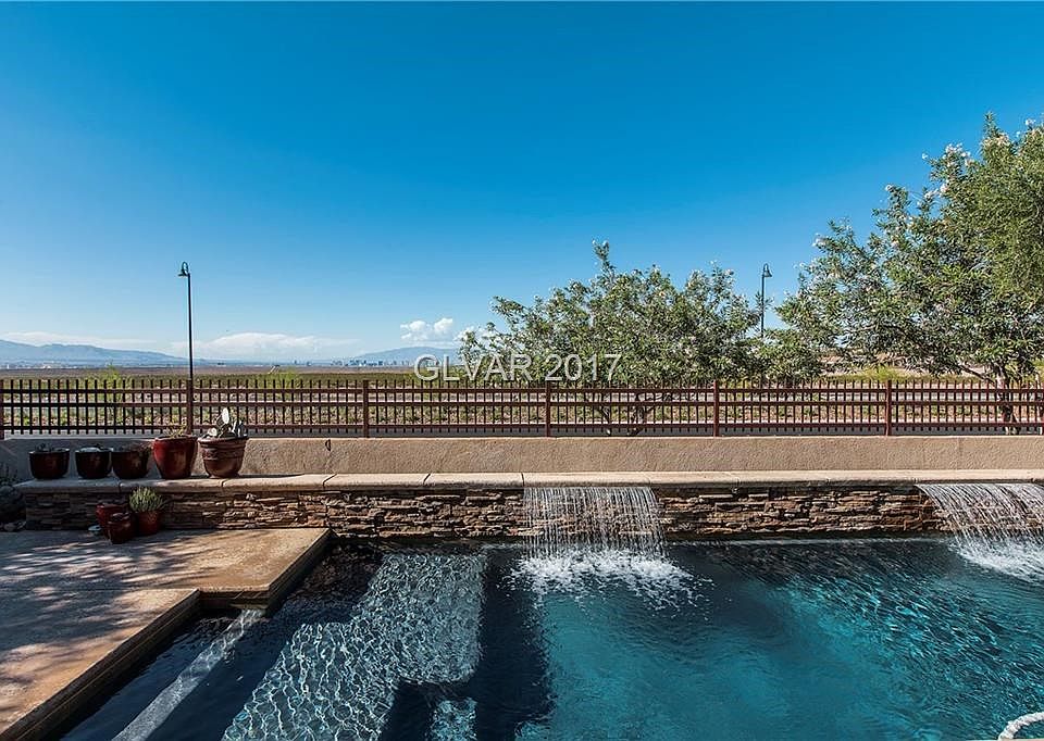 Stunning unobstructed full strip views!!!!  Step out of your backyard and enjoy a beautiful view.