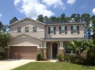 44 Rollins Ln, Palm Coast, FL 32164
