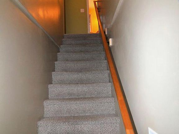 Stairway from entrance up to apartment.