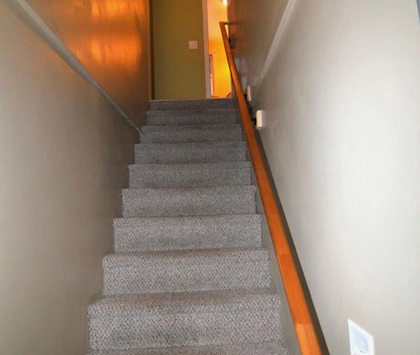 Stairway from entrance up to apartment.