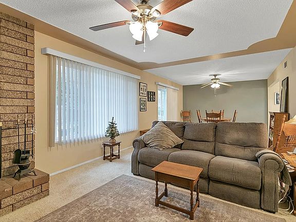 Living Room & Dining Room (behind) prior to renovated flooring