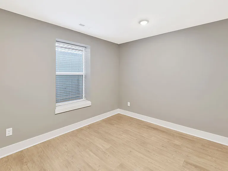 bedroom on lower level with view out window