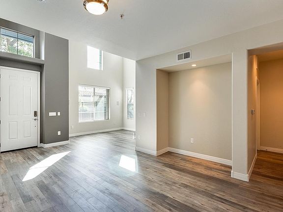 View from kitchen to living room and entry (before furniture)