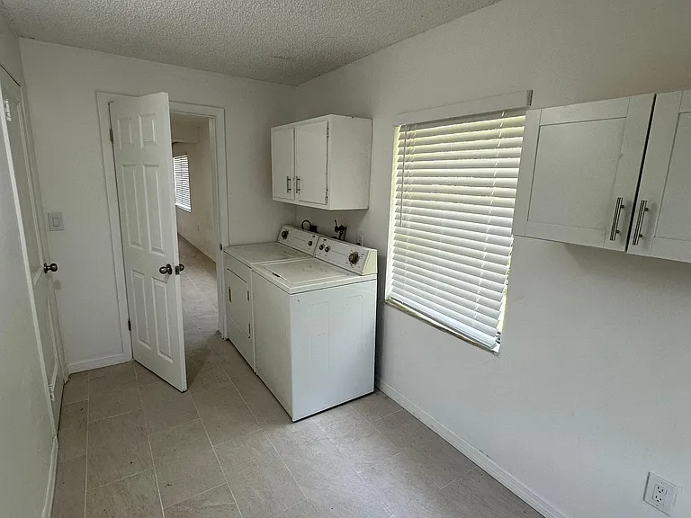 Laundry Room 2nd view not staged