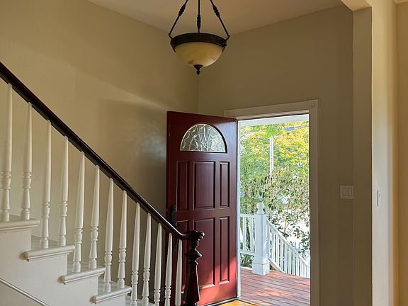 Front Entrance door and period stairs to the two bedrooms on the second floor.