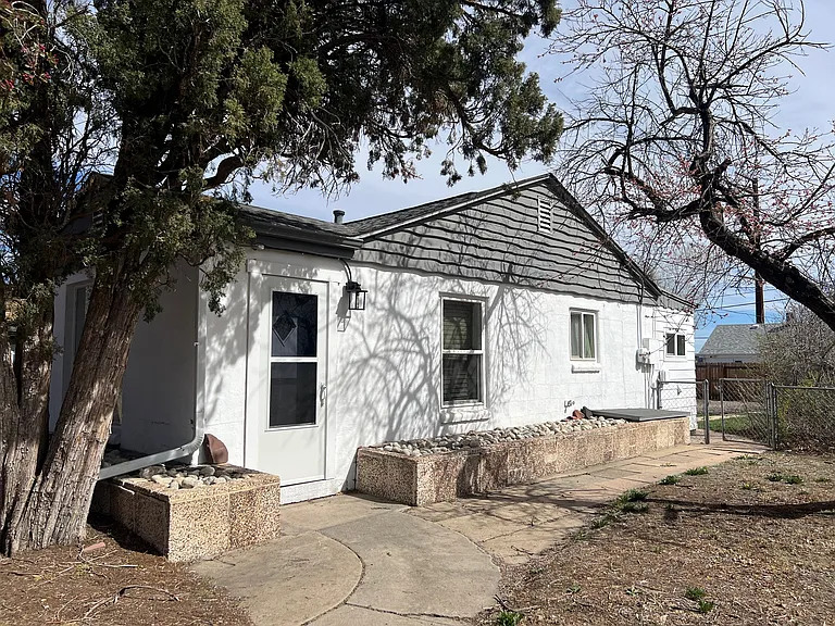 Side view, gate leading to backyard