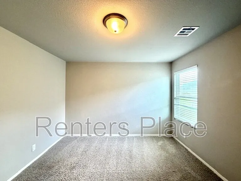 14215 N 74th East Ave — Photo 4