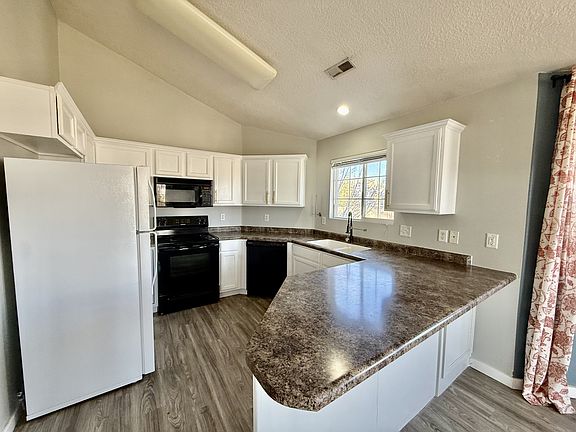 2nd image of 115 W Daybreak Ln #1