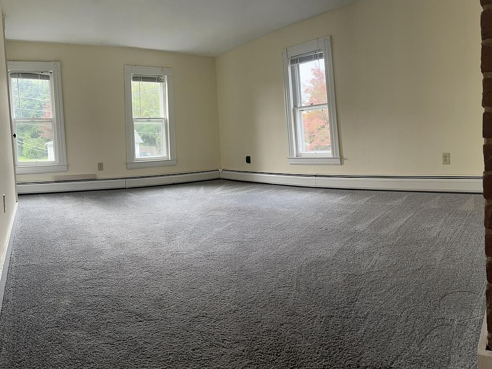 Large living room with plenty of natural light