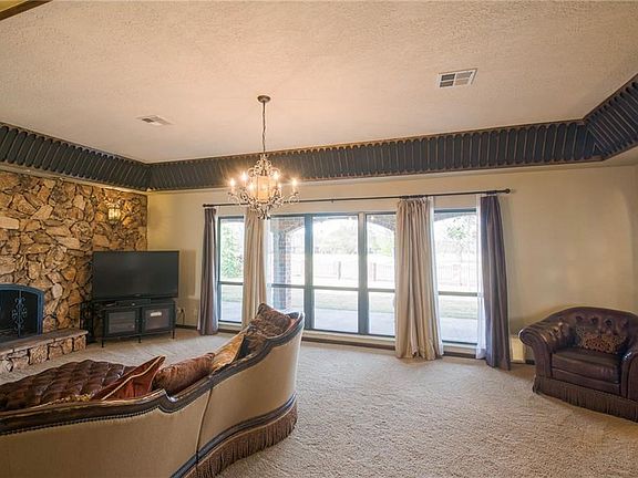 New windows line the entire back of the home - these look out on the golf course - one of the prettiest views on the course. Situated where golf balls are NOT a problem!