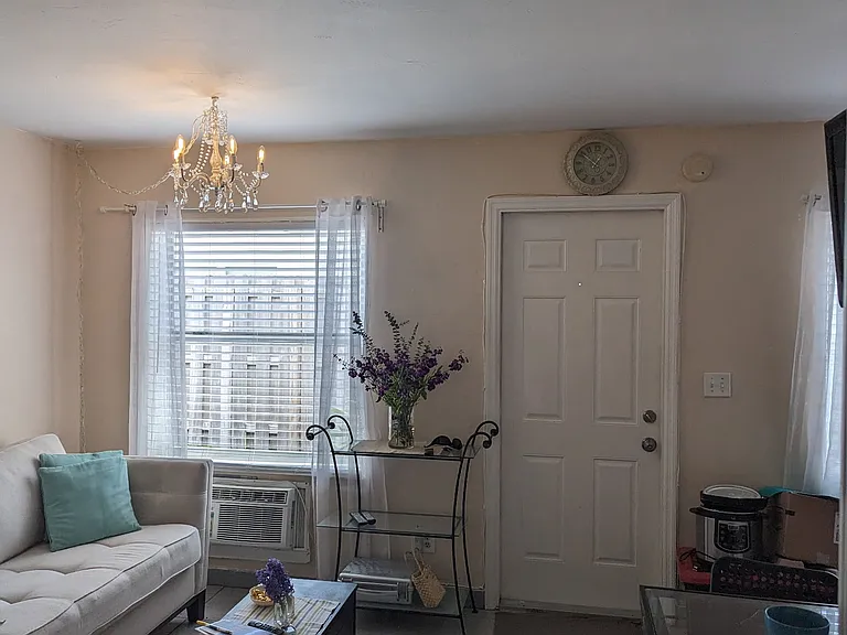 Couch and living space 
Bright and with new window blinds