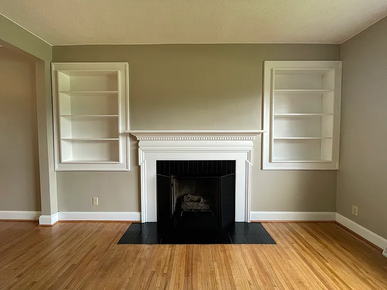 Living room with built ins. Fireplace is NOT functional
