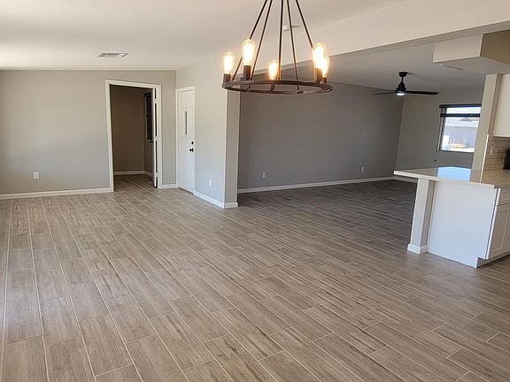 Dining room facing living room and partial kitchen