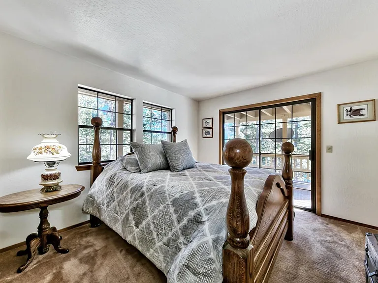 Bedroom 2 - Queen room with mid-level wrap around deck access.